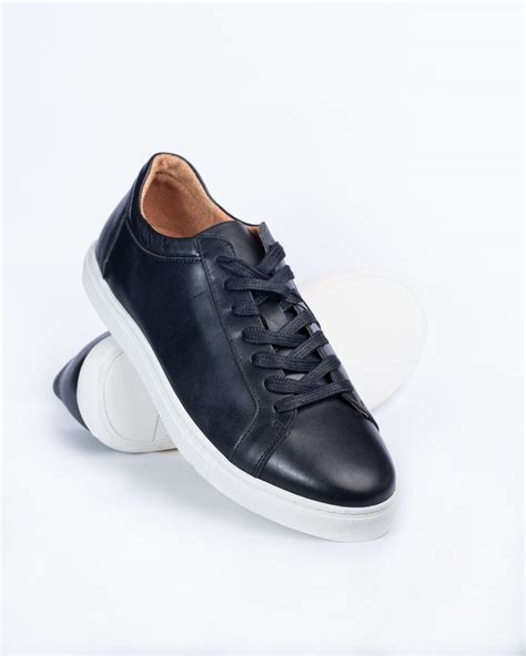 black leather trainers white sole.